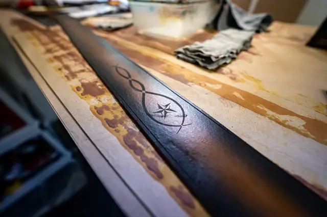 Engraved Acoustic Guitar Strap, Star & Arrowhead, handmade by Lander Leather